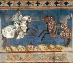 Fresk z Palazzo Comunale (San Gimignano, Toskania, Włochy) z 1289 r. Twórcą fresku jest włoski malarz Azzo di Masetto (aktywny w drugiej połowie XIII wieku).Dzieło to jest częścią szerszego cyklu malowideł ściennych określanego jako Sceny z turniejów i polowań (ang. Tournament and Hunting Scenes). Obrazuje dworską kulturę rycerską tamtej epoki. Charakteryzuje się żywą dynamiką ujęcia oraz szczegółowym przedstawieniem oporządzenia rycerskiego – na przykład precyzyjnie namalowanymi detalami heraldycznymi, takimi jak tarcze z czarnym lwem (lion rampant sable), z którymi szarżuje rycerz po prawej stronie.